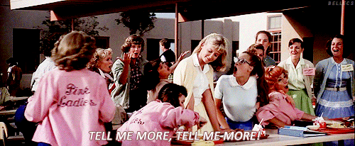 gif from Grease 'tell me more tell me more'