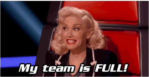 gif of Christina Aguilera clapping and happily saying 'my team is full!'