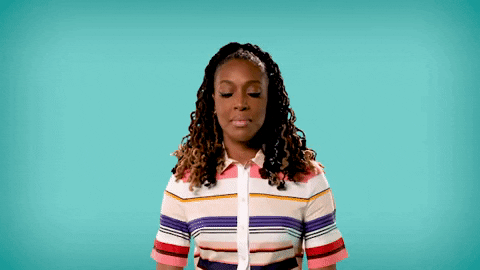 gif of a woman taking in a slow, deep breathe and smiling