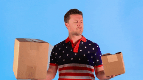 gif of a man juggling two boxes and looking contemplative, as if he's deciding between two options