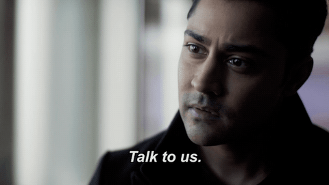 gif of a man saying 'talking to us' to someone off screen