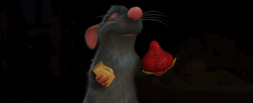 gif of Remy from Ratatouille enjoying a bite of a strawberry