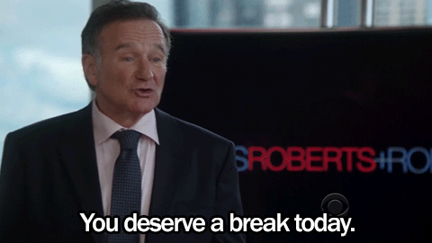 gif of Robin Williams saying 'you deserve a break today'