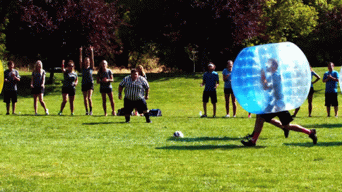 gif of people playing bubble soccer