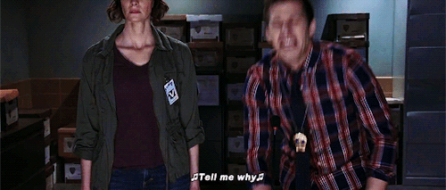 gif of Jake Peralta from Brooklyn 99 singing 'tell me why'